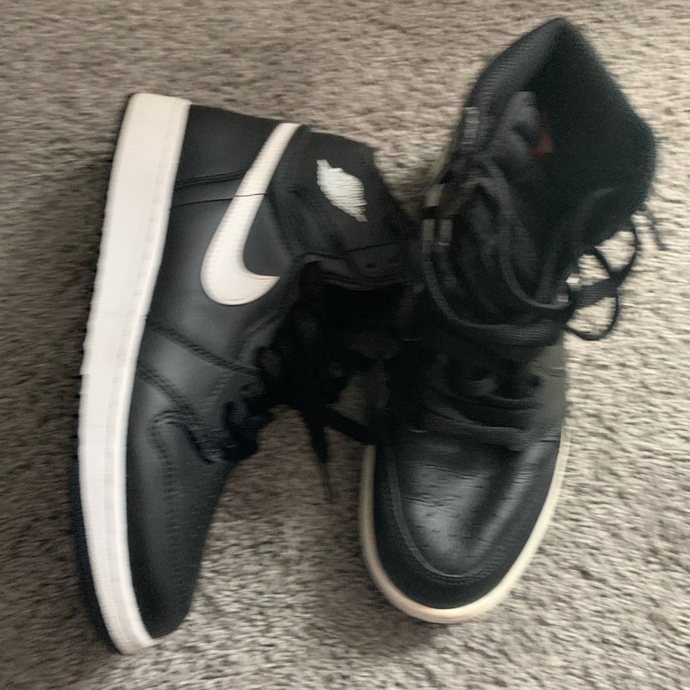 Nike Black and White Air Jordan 1 Mid Sneakers